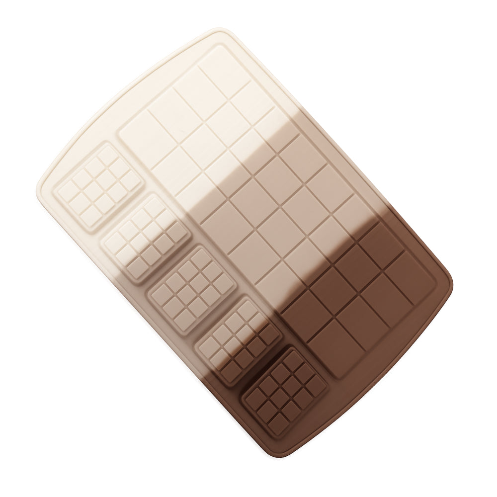 Chocolate mold with beige and brown sections on a white background
