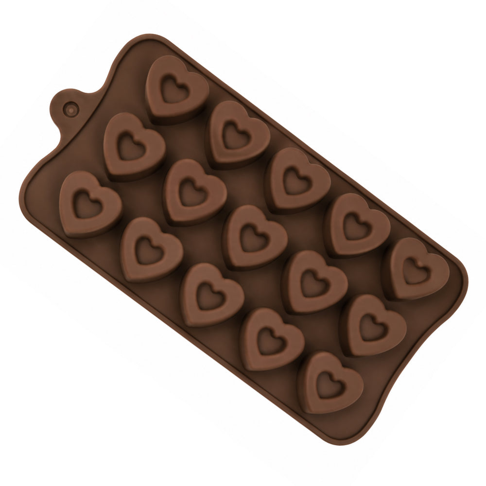 Brown silicone mold with heart shapes on a white background