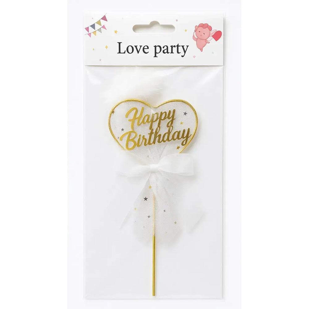 Gold 'Happy Birthday' heart-shaped cake topper in packaging with 'Love Party' text.