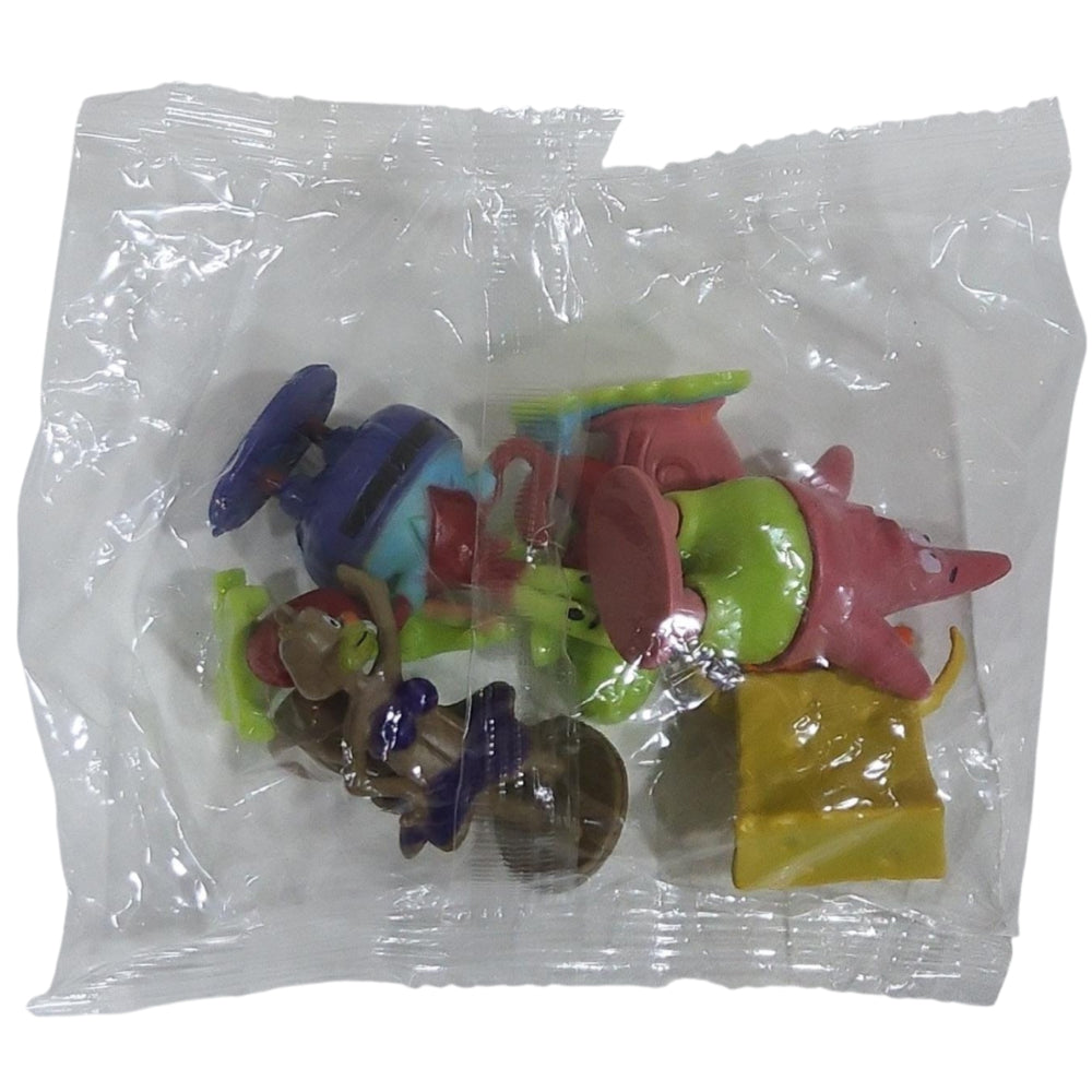 Colorful Spongebob toys in a clear plastic bag on a white background