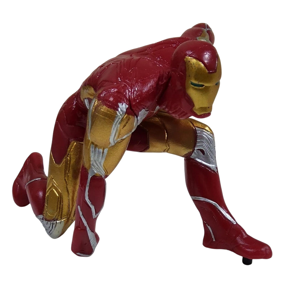 Red and gold superhero figure on a white background