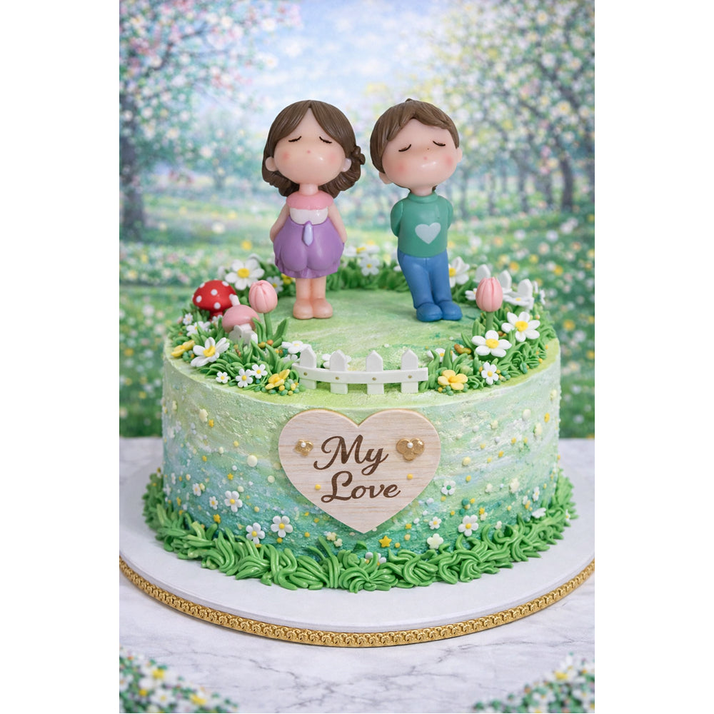 Decorative cake with Miniatures of a couple and a heart-shaped 'My Love' sign, set against a garden background.
