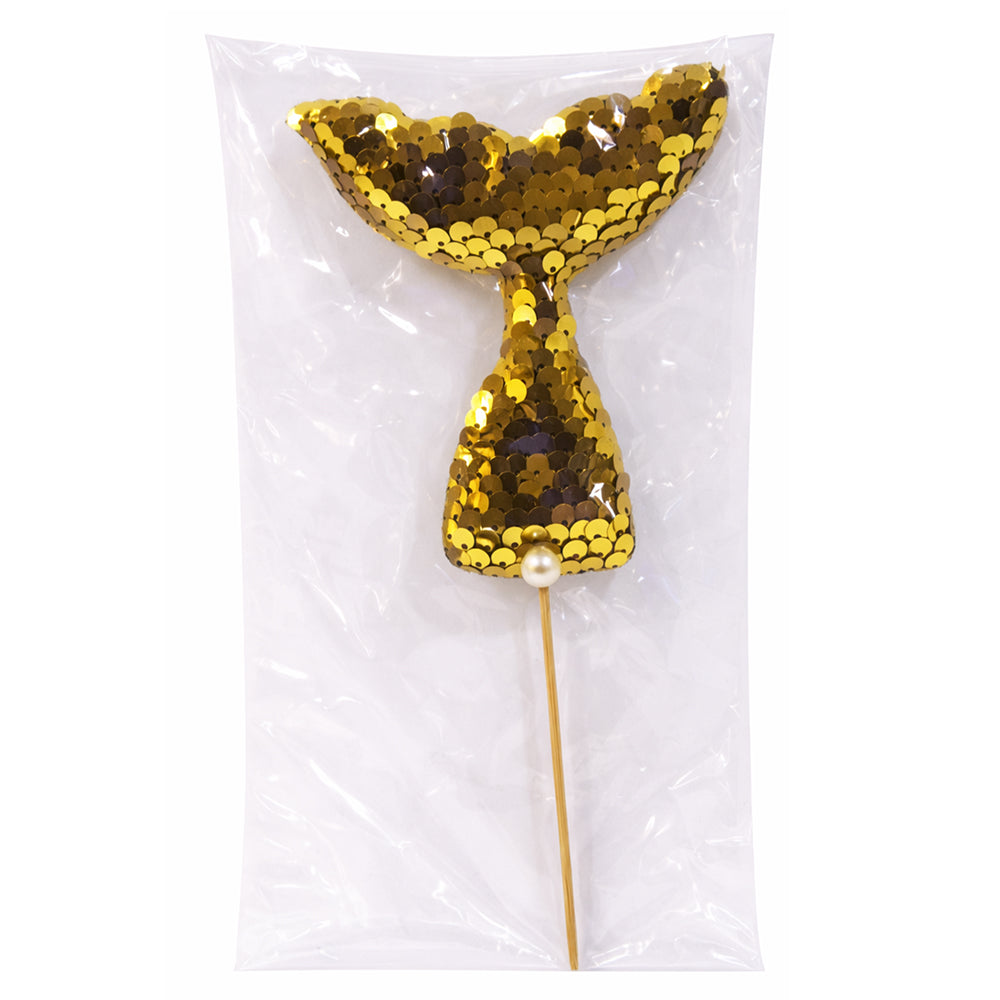 Gold sequin mermaid tail on a stick with a pearl in clear packaging.