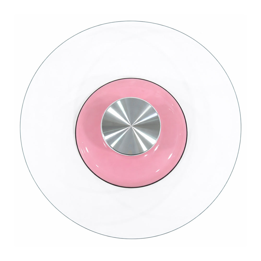 Round glass turntable with pink rim and silver center on a white background