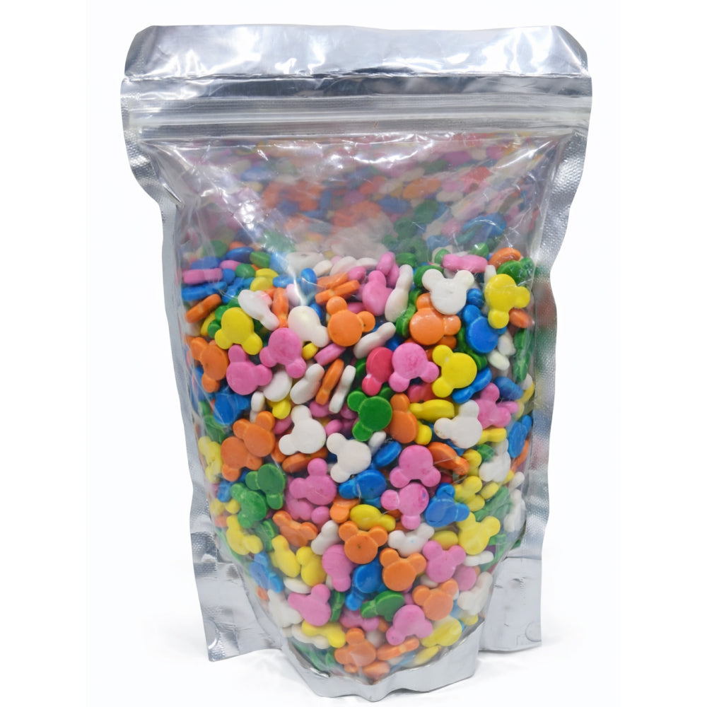 Bag of colorful candy hearts with a white background