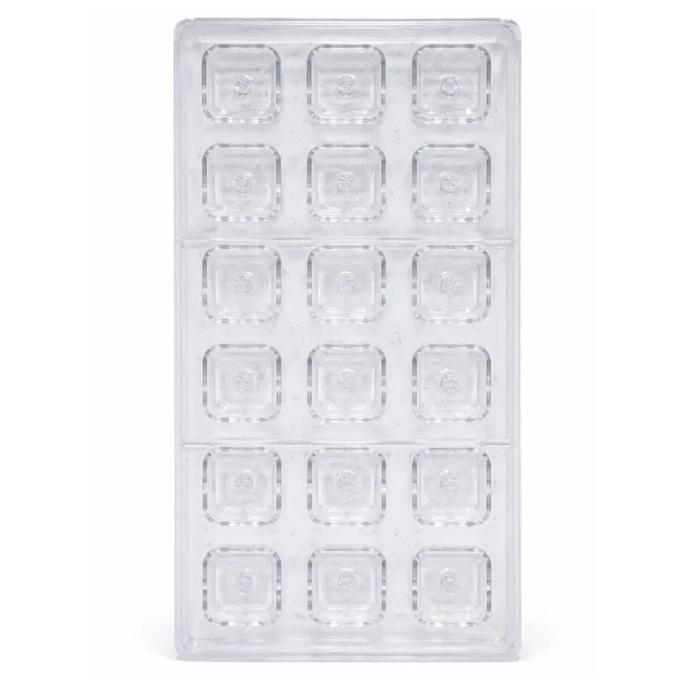 Clear Polycarbonate mold with square cavities on a white background