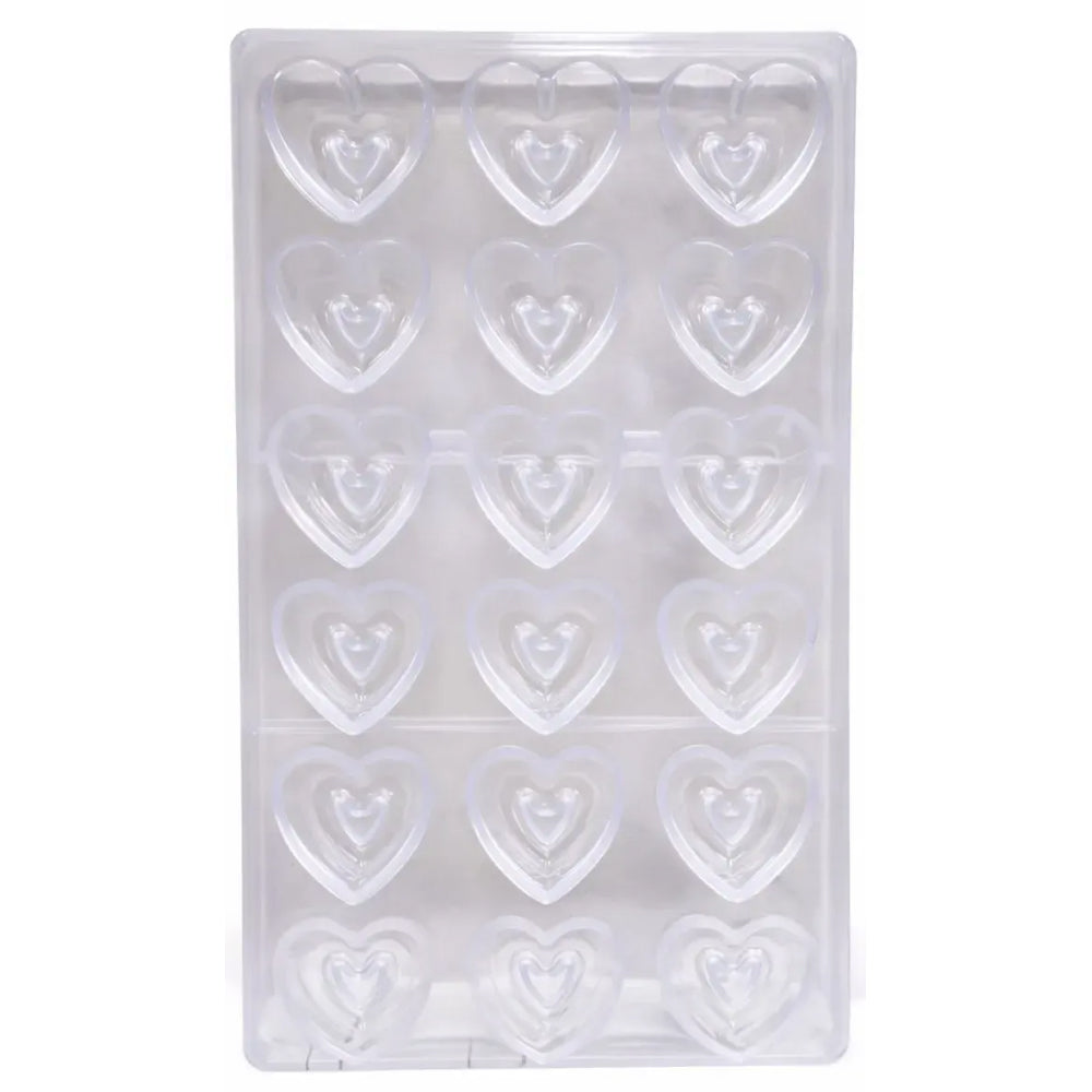 Polycarbonate mold with heart shapes on a white background