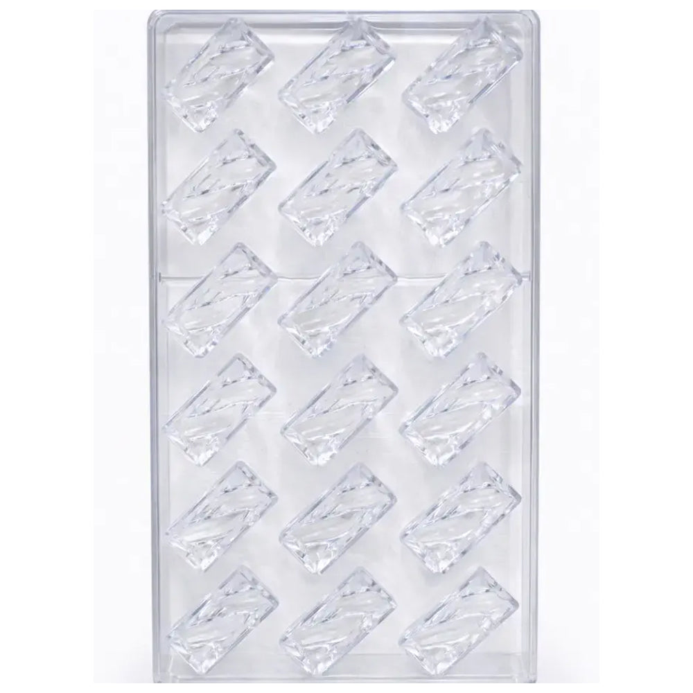 Polycarbonate mold with rectangular cavities on a white background