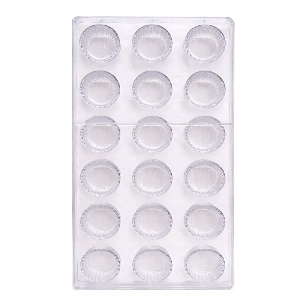Clear polycarbonate mold with multiple small round compartments on a white background