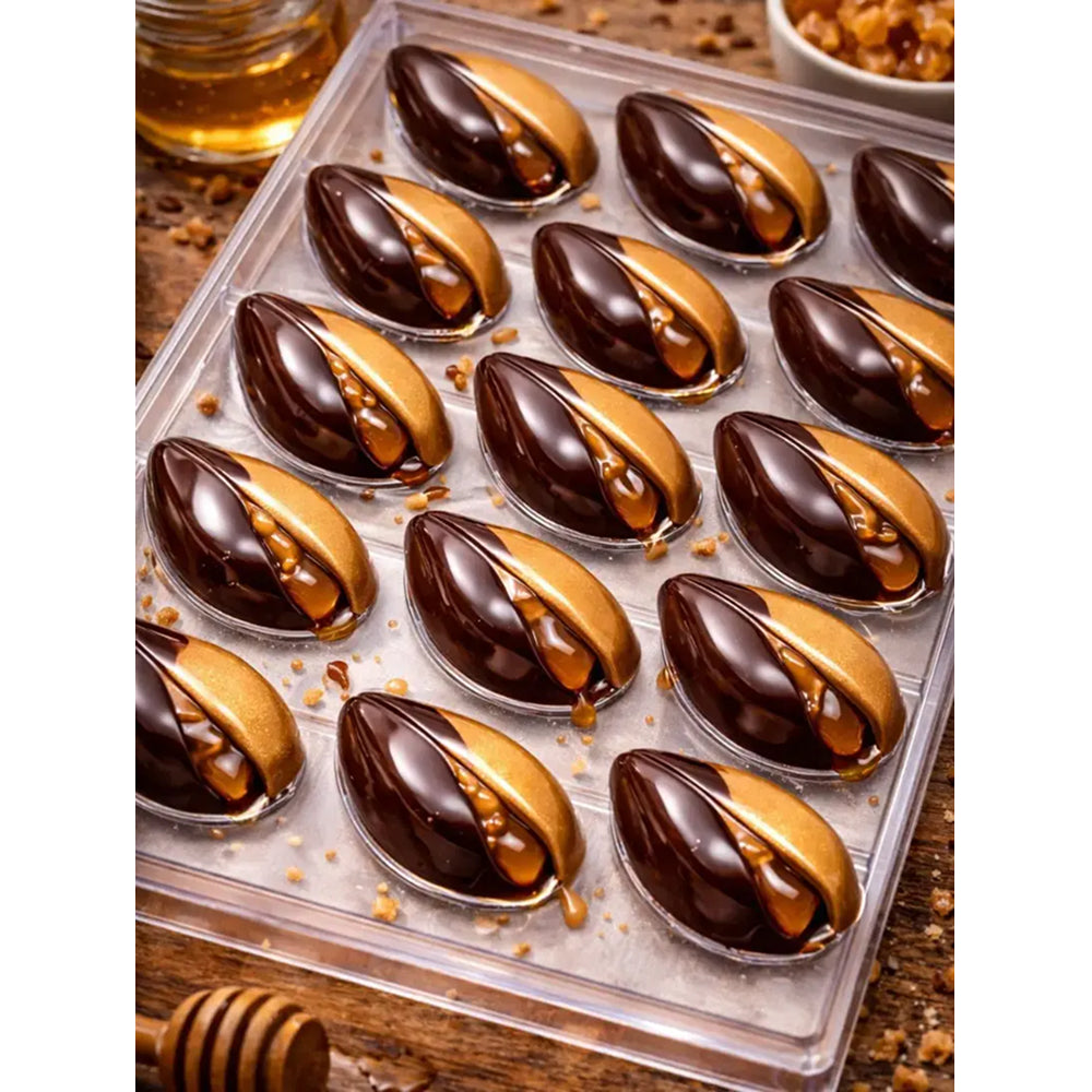 Polycarbonate chocolate mold-covered treats on a wooden surface