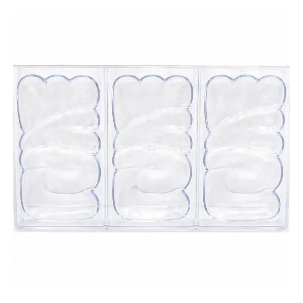 Polycarbonate mold with love-shaped cavities on a white background