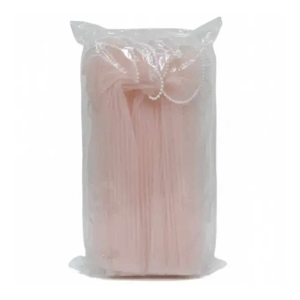 Clear plastic bag containing baby pink on a white background