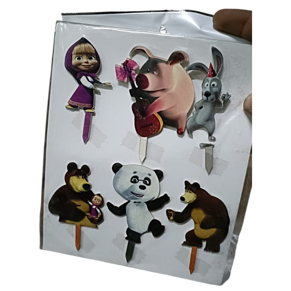Set of cartoon character cake toppers in packaging