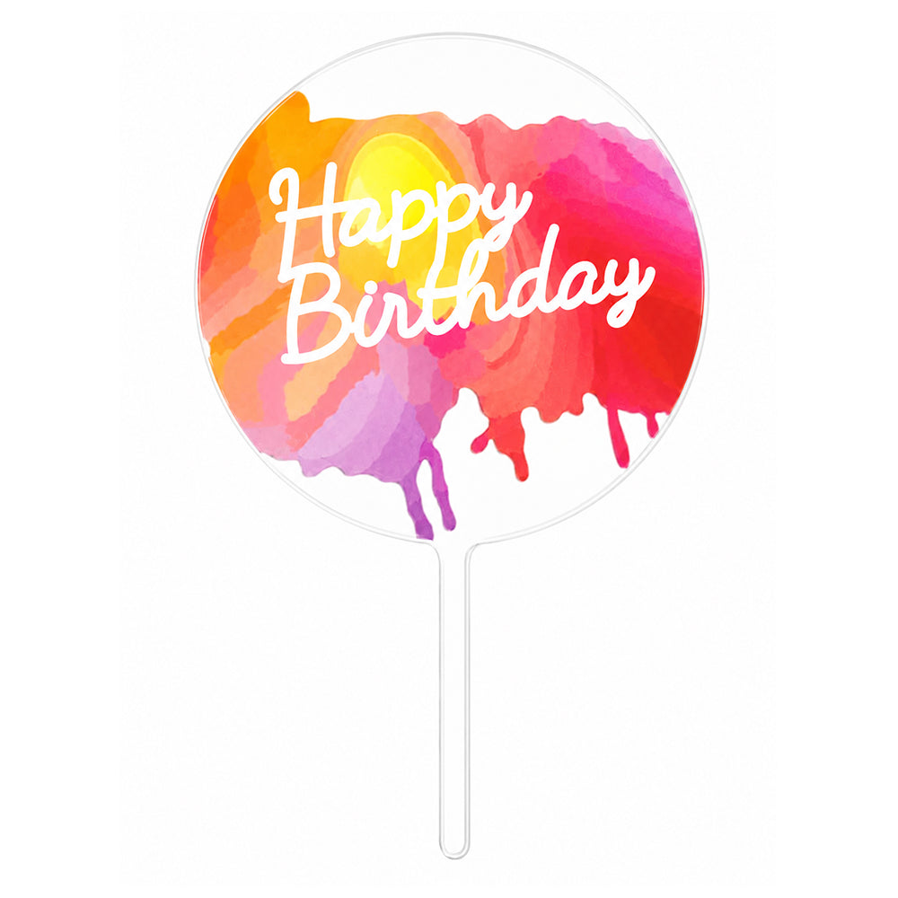 Colorful cake topper with 'Happy Birthday' text on a white background