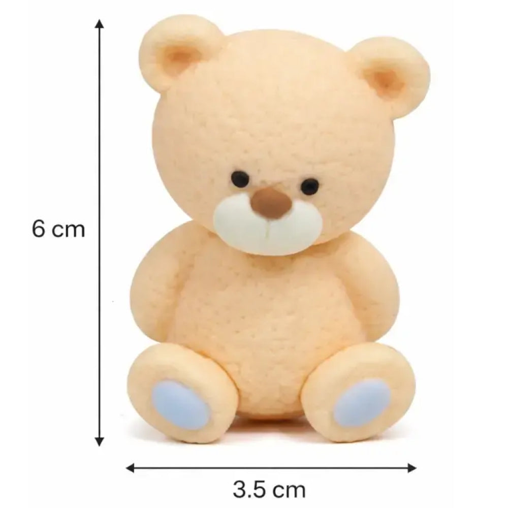 Small beige teddy bear with dimensions labeled on a white background