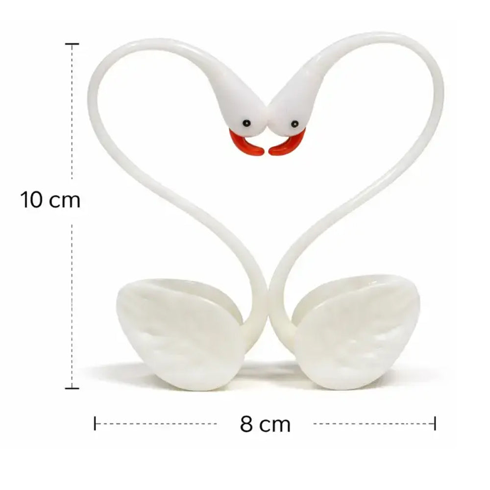 White silicone heart-shaped Swan product with measurement indicators on a white background