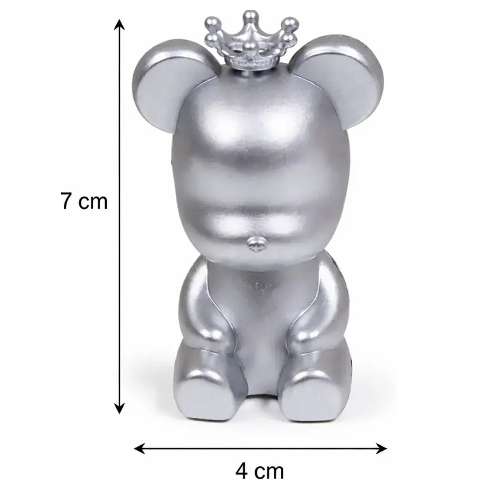 Silver teddy bear figurine with a crown, shown with dimensions on a white background
