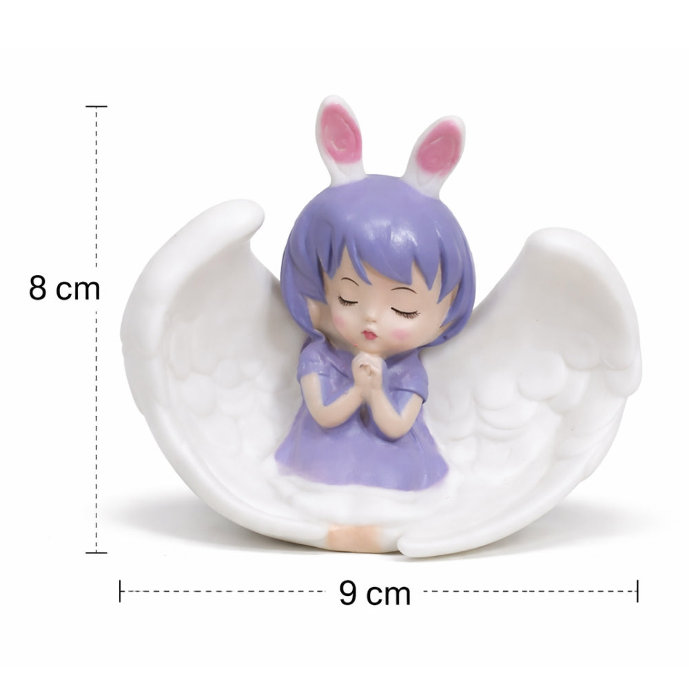 Small figurine of a girl with purple hair and bunny ears sitting on a white crescent moon, with measurements indicated.