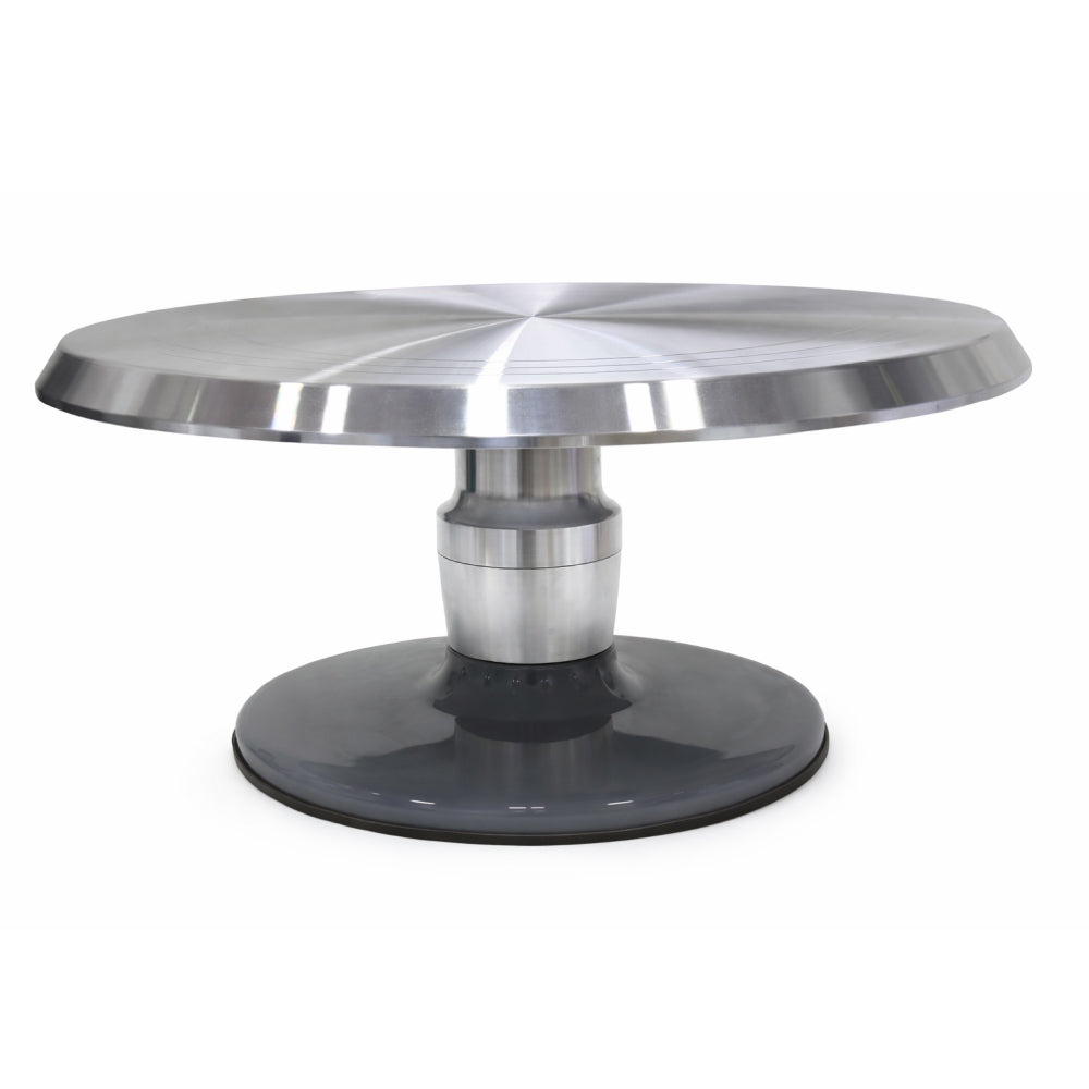 Steel round turntable with a central pedestal on a white background