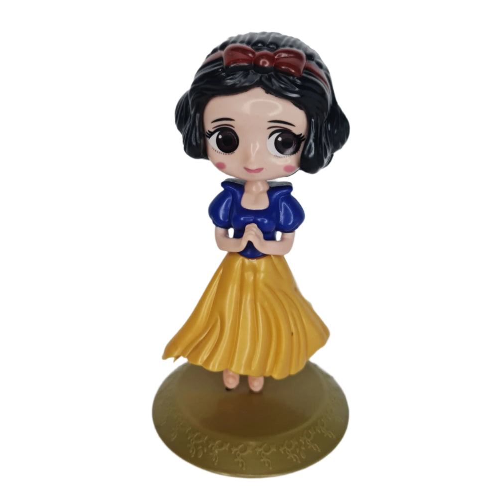 Girl With Yellow Frock Miniature Cake Toy Topper on white background for clear product view