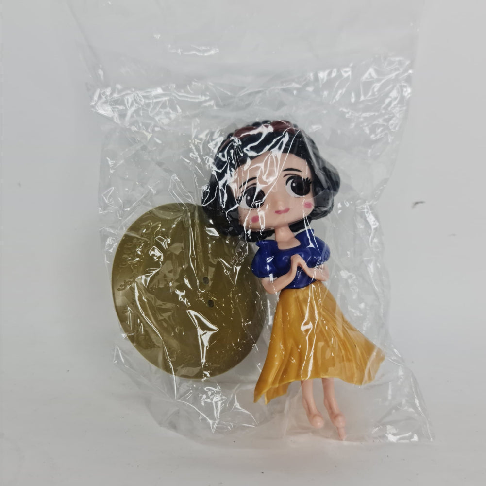 Girl With Yellow Frock Miniature Cake Toy Topper in packaging displayed on clean background