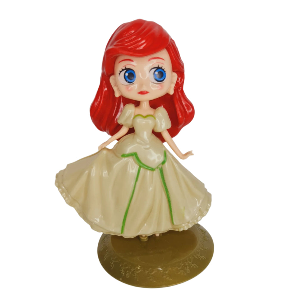 Girl With Yellow Gown Cake Toy Topper on white background for clear product view