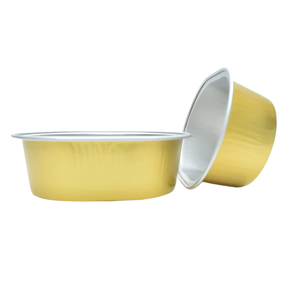 Golden Egg Shaped Foil Containers, one placed sideways on the side of the other, on a white background.