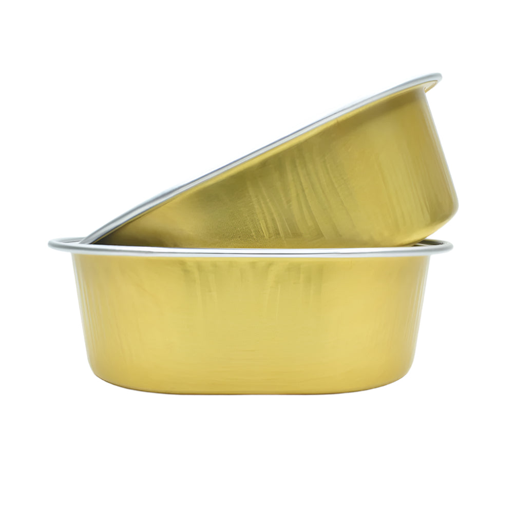 Golden Egg Shaped Foil Containers, one placed sideways on top of the other, on a white background.