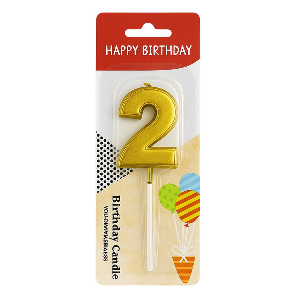 Close-up of Golden Number 0 Candle in packaging on white background