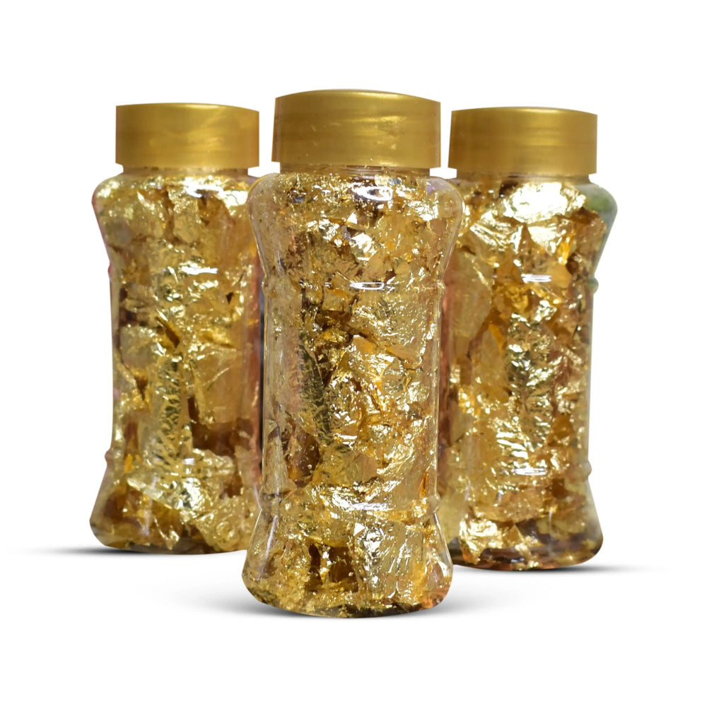Non-Edible Golden Flakes displayed on a white background for a clear view of their texture and appearance.