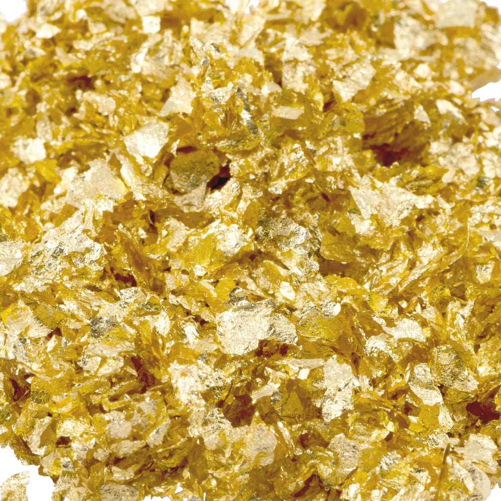 Zoomed-in view of Non-Edible Golden Flakes showcasing their delicate texture and metallic shine.