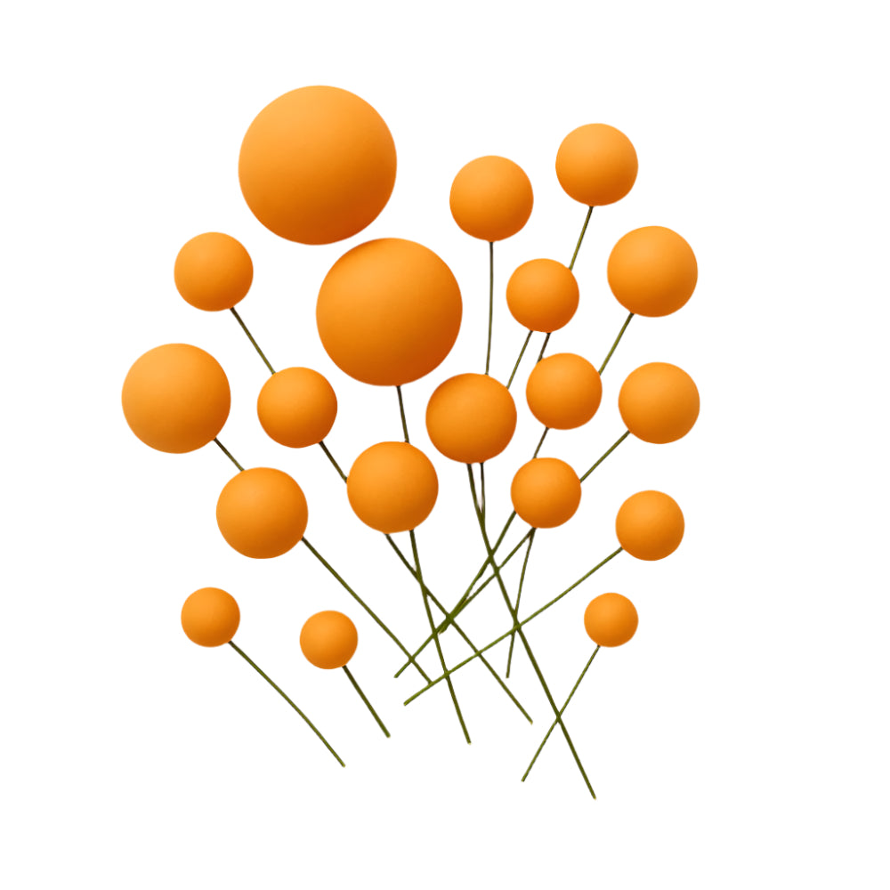 A set of Orange Matte decorative faux balls spread evenly on a white background, showcasing their color and texture for cake decoration.
