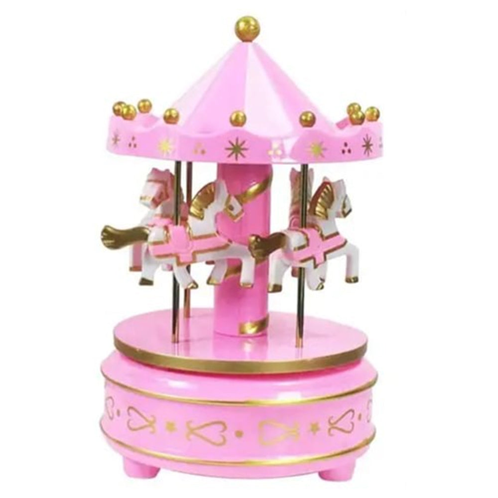 Close-up of Pink Carousel Cake Toy Topper on white background