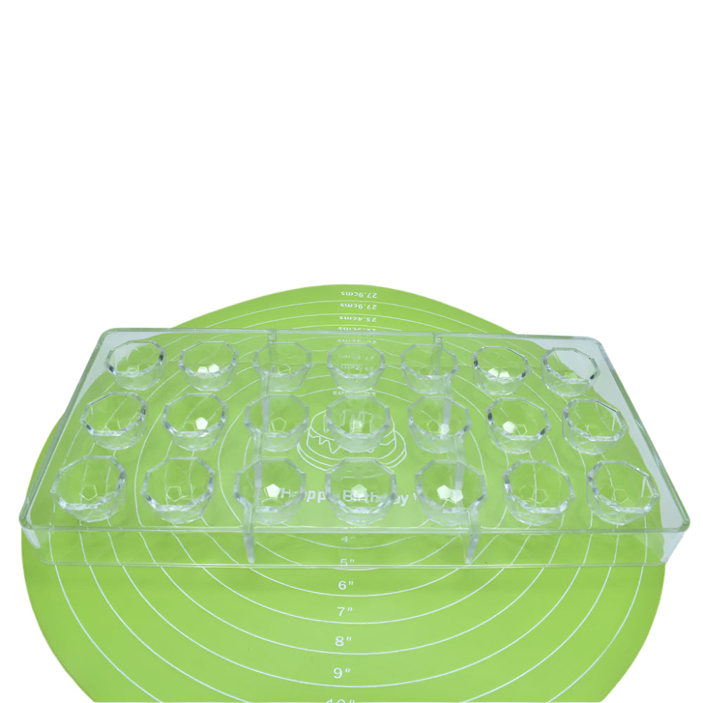 Polycarbonate Chocolate Bar Mold placed on a green baking mat against a white background for a detailed view.