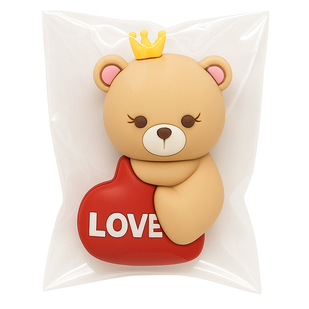 Princess-style teddy bear cake topper sealed in clear plastic pouch, featuring a light beige bear hugging a red heart with the word “LOVE” in bold white text, wearing a golden crown and soft pink ears – perfect for Valentine’s Day, romantic cakes, or cute birthday themes