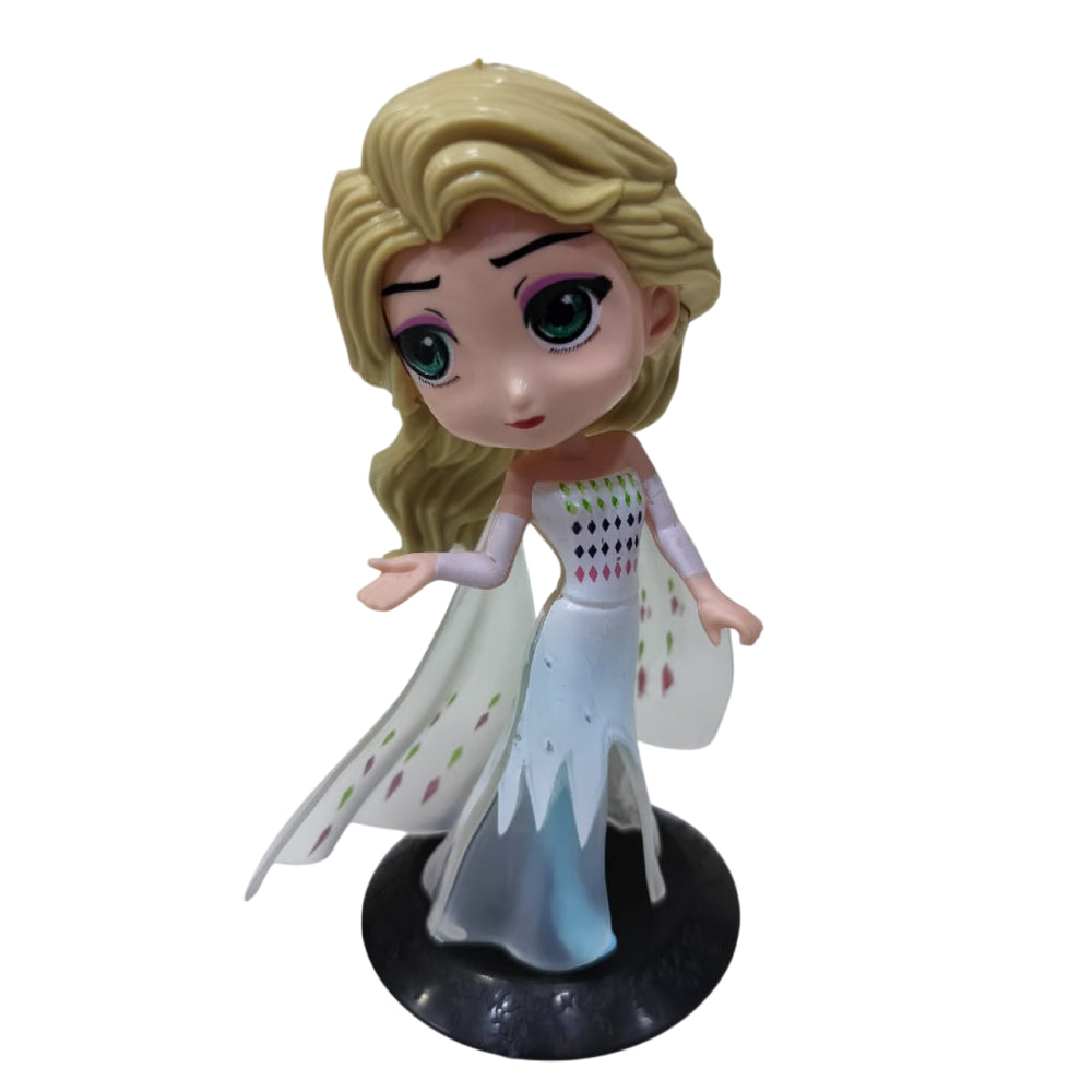 Close-up of Princess Doll Cake Toy Topper on white background