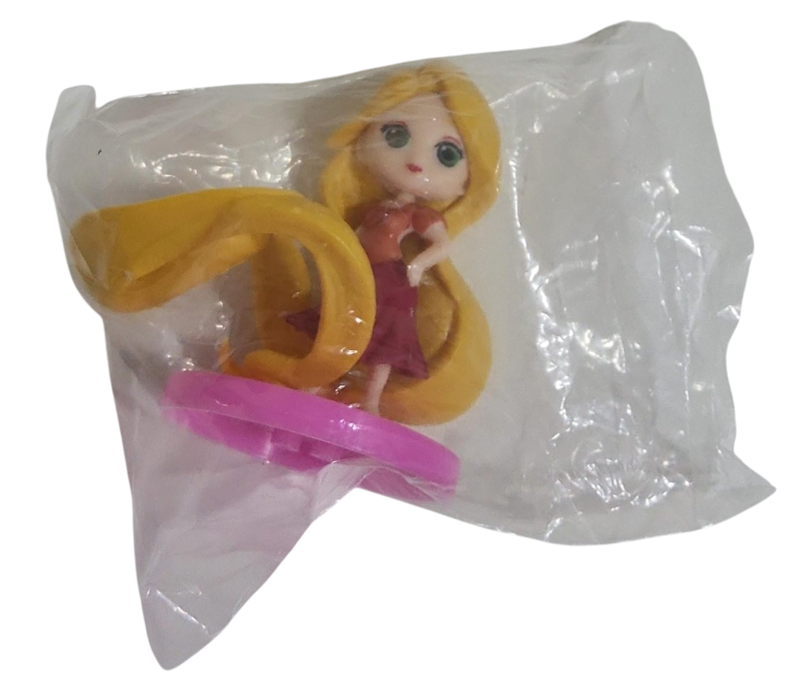 Toy figure with blonde hair and a pacifier princess in a clear transparent bag on a transparent background