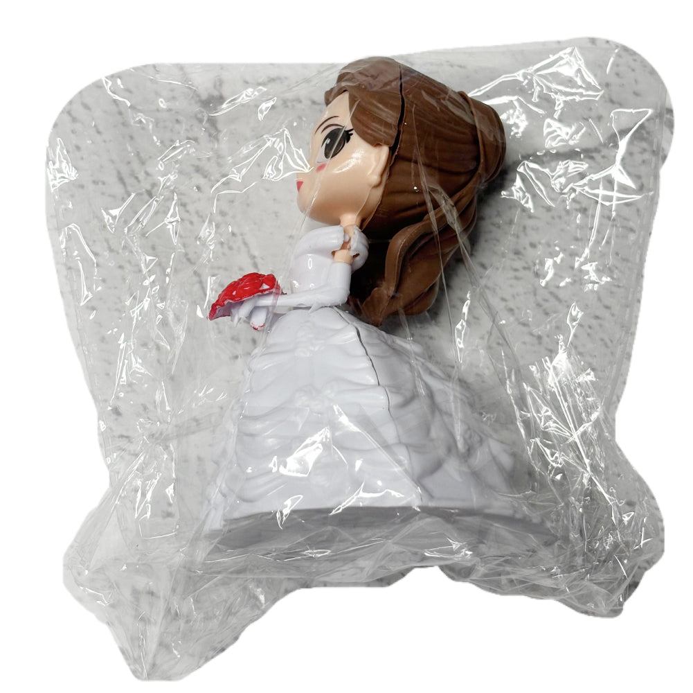 White Wedding Gown Doll Cake Topper in packaging on white background