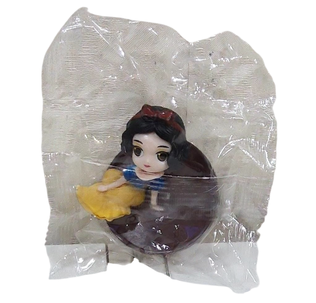 Toy princess figurine in a transparent plastic bag on a transparent background