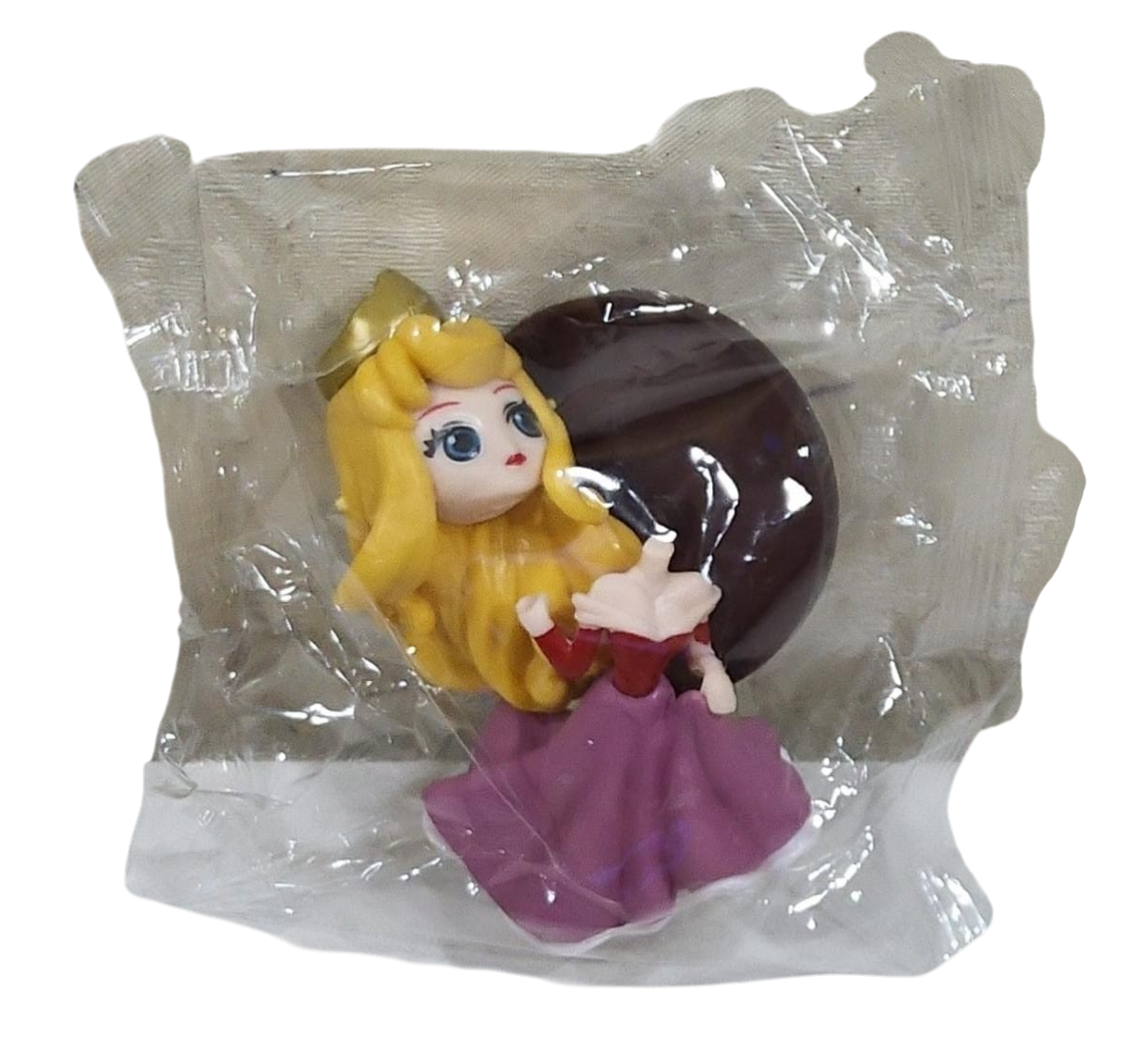 Toy figure of a princess in a transparent package on a transparent background