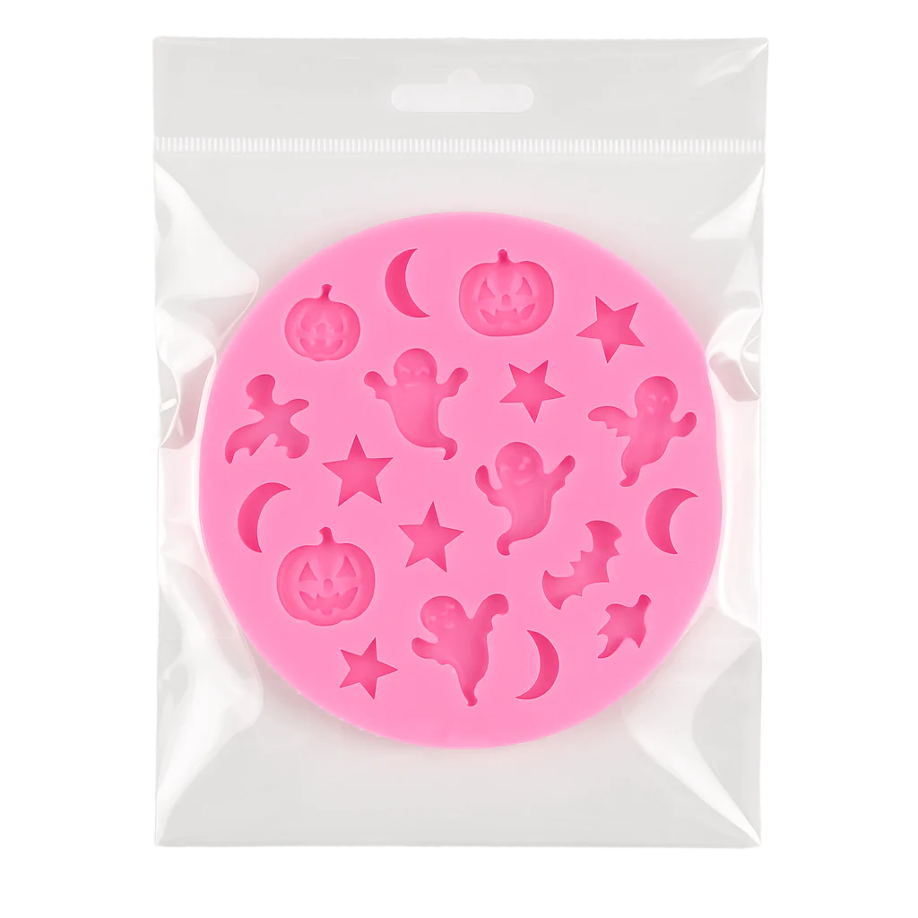 Pink silicone mold with Halloween designs in a clear plastic packaging on a white background