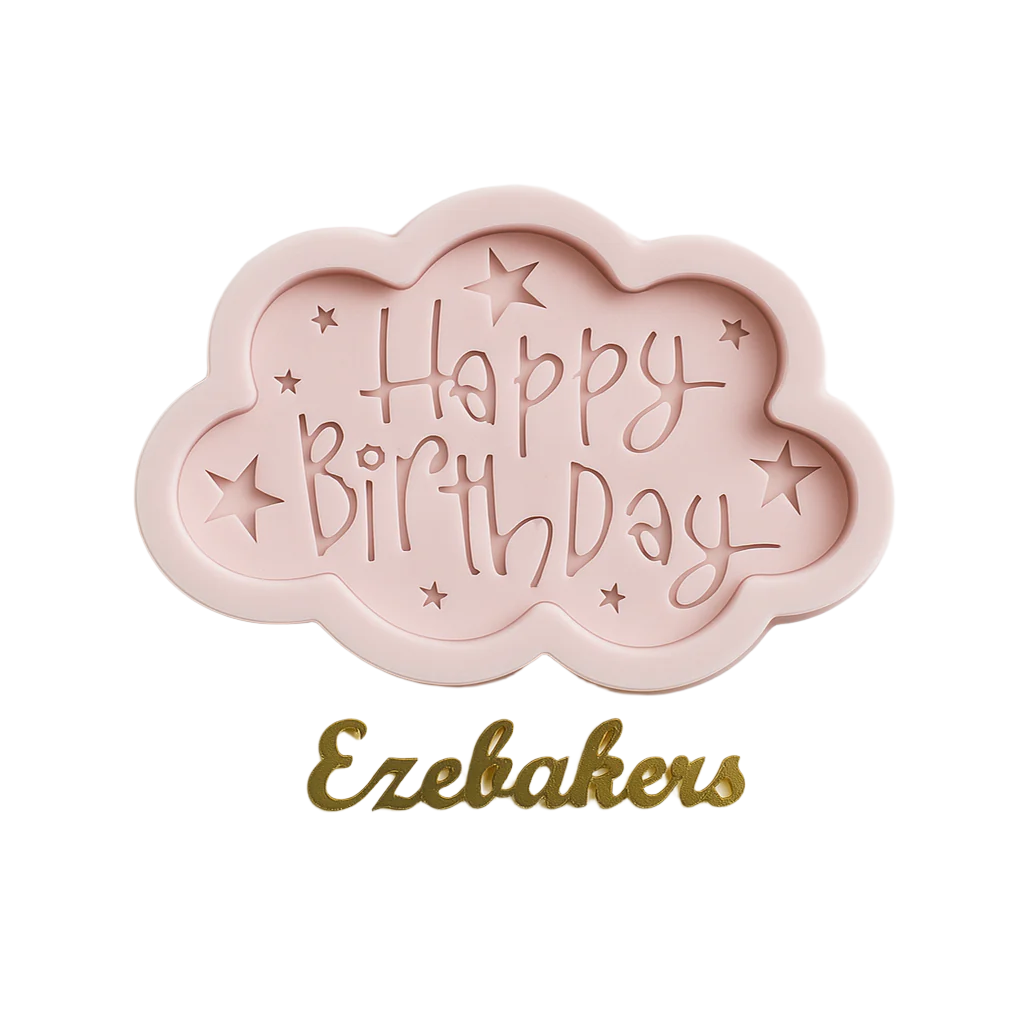 Pink cloud-shaped cookie cutter with 'Happy Birthday' text on a light gray background