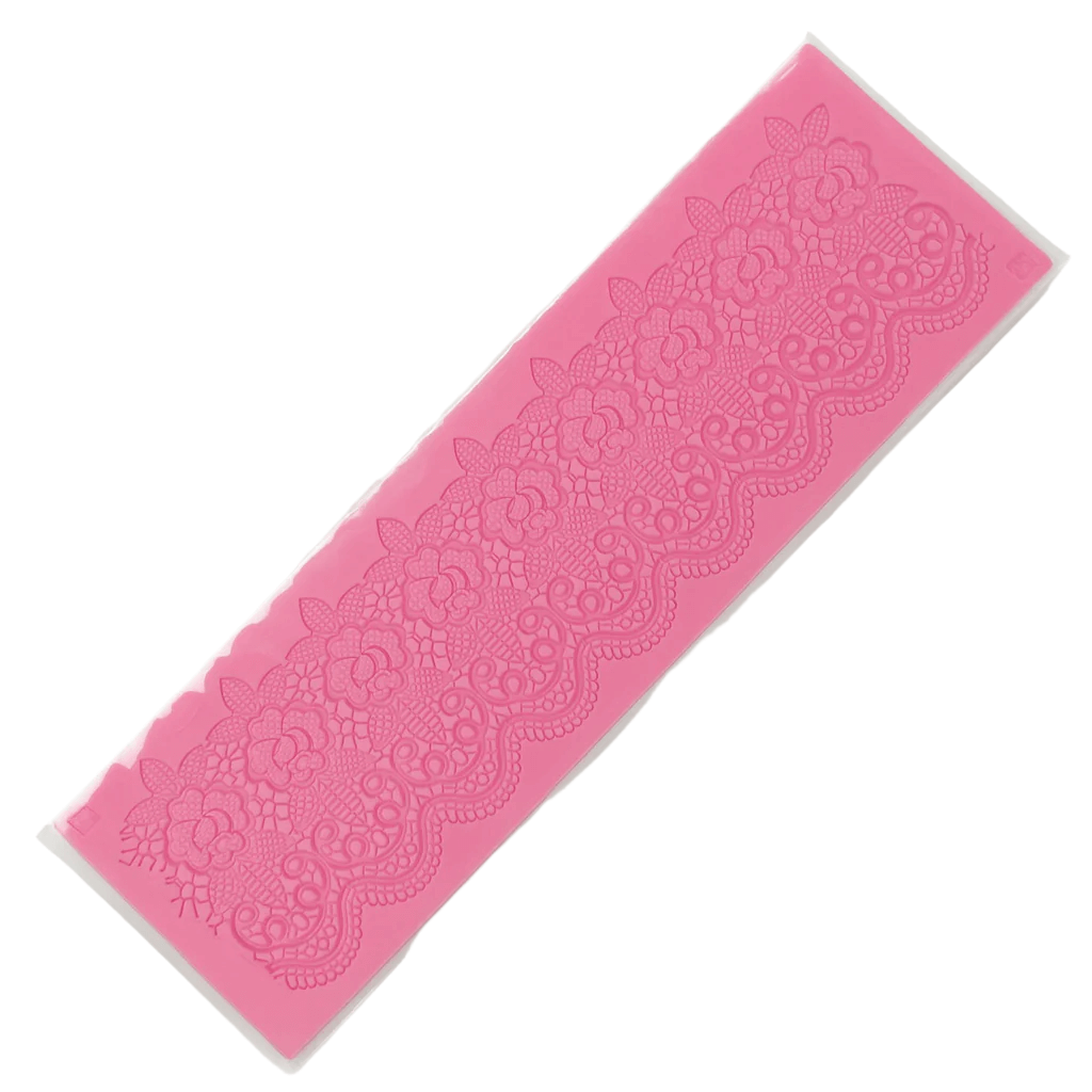 Pink silicone fondant lace mat design on a white background