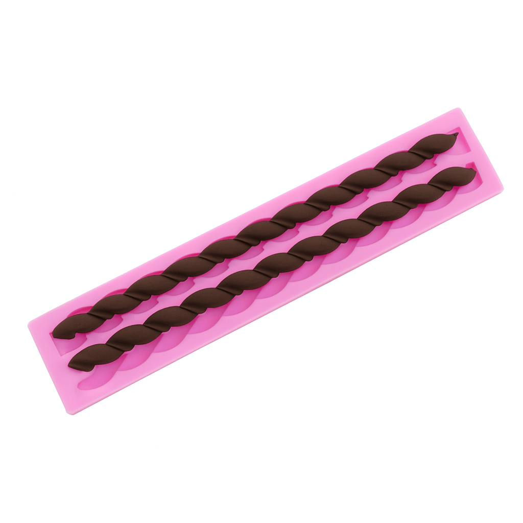 Pink silicone fondant mold with chocolate-like twisted shapes on a white background. To display the fondant mold's real output