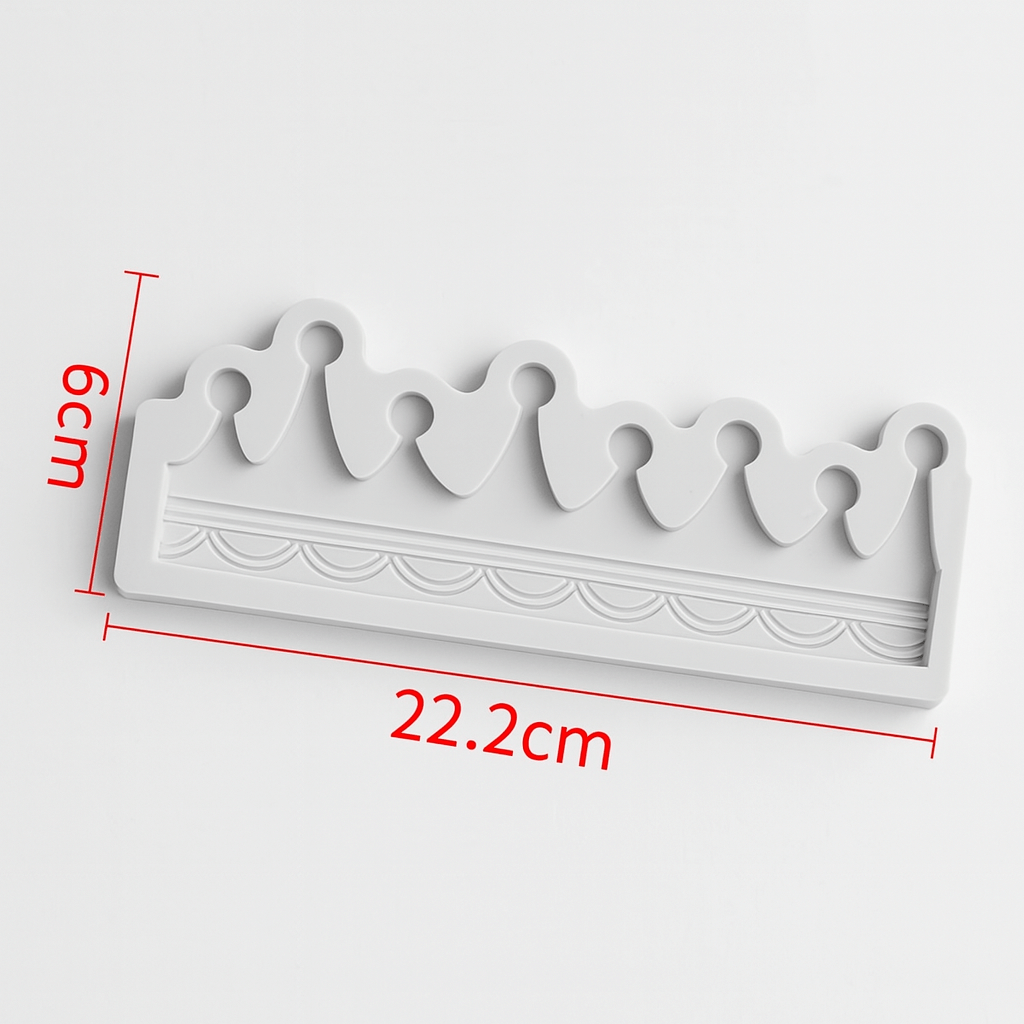 White crown-shaped silicone fondant mold with dimensions on a white background