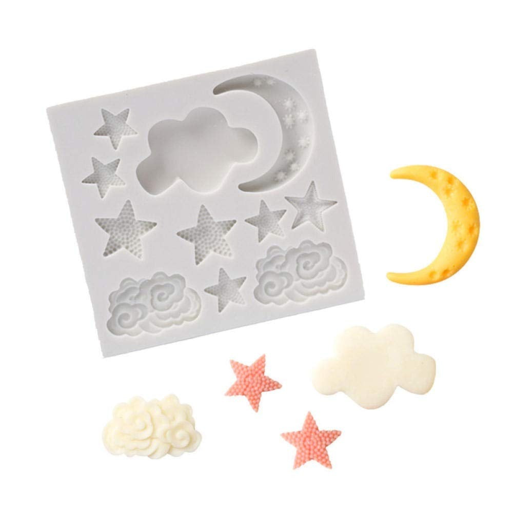 Silicone fondant mold with star, moon, and cloud shapes next to shaped candies, showcasing real output on a white background