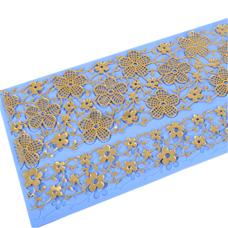 Decorative paper with gold floral patterns on a blue background