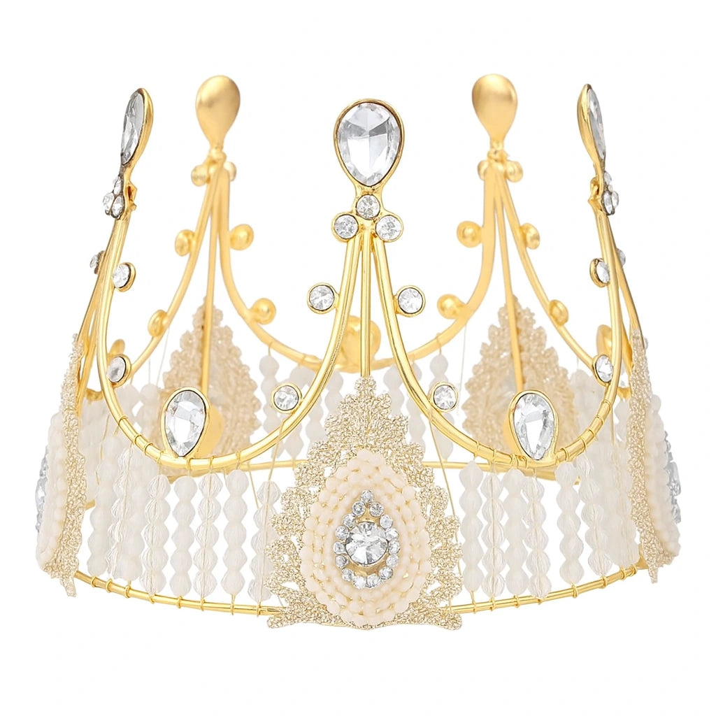Gold and white cake crown topper  with crystal accents on a white background